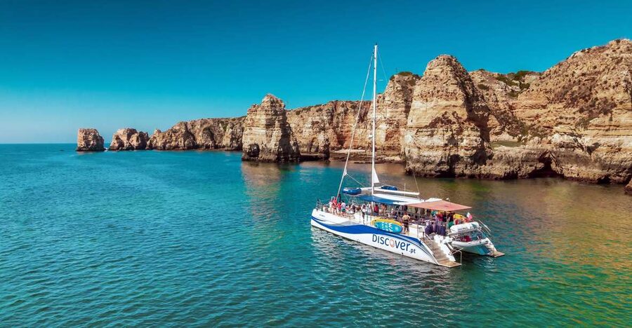 From Lagos: Algarve Golden Coast Cruise - Praia da Luz and the black rock at Praia dos Rebolos