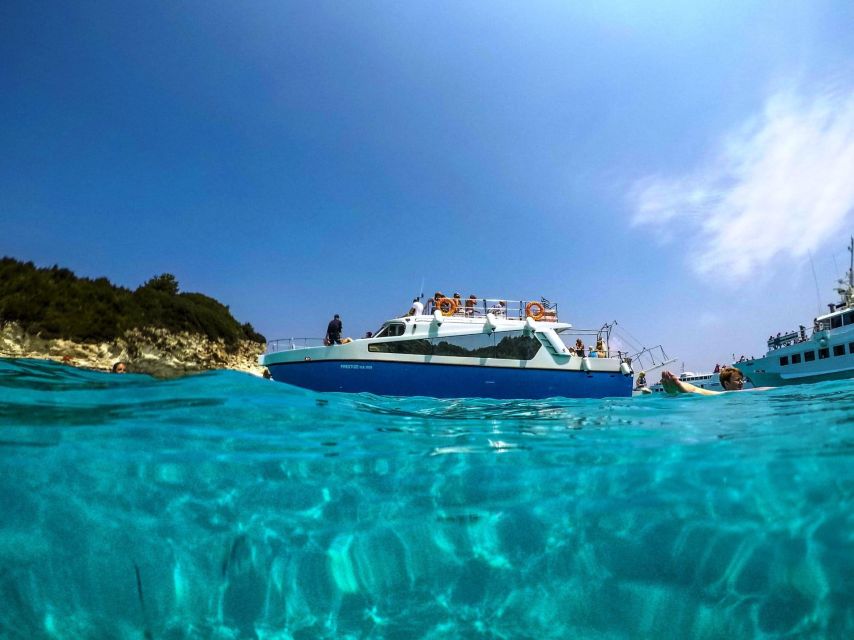 From Lefkimmi: Syvota, Blue Lagoon and Cave Sunset Cruise - Swimming in the Blue Lagoon