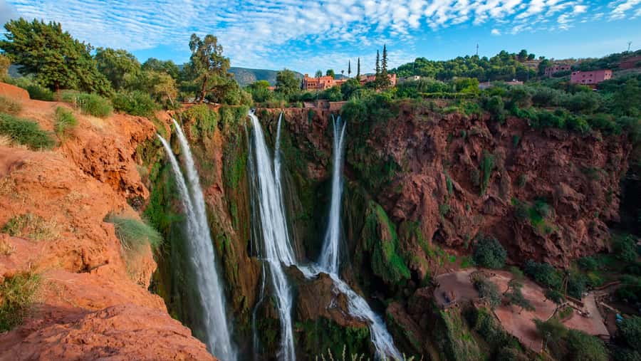 From Marrakech: Guided Ouzoud Waterfalls Tour with Boat Ride - Walking from the rim to the valley