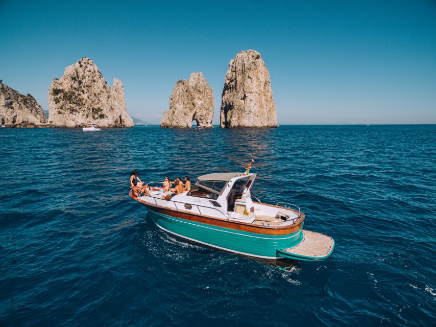 From Naples: Capri Boat Day Trip with Drinks - The grottos, arches, and Faraglioni