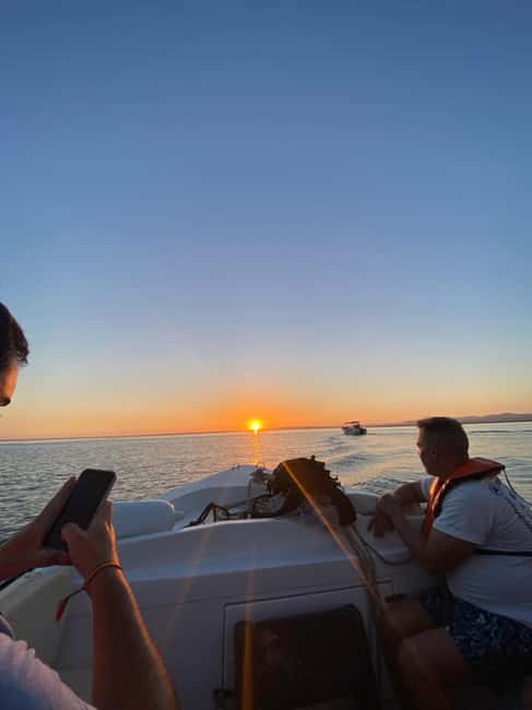From Olhão: Ria Formosa Sunset Island Boat Tour - Ilha da Armona, drinks, and local atmosphere