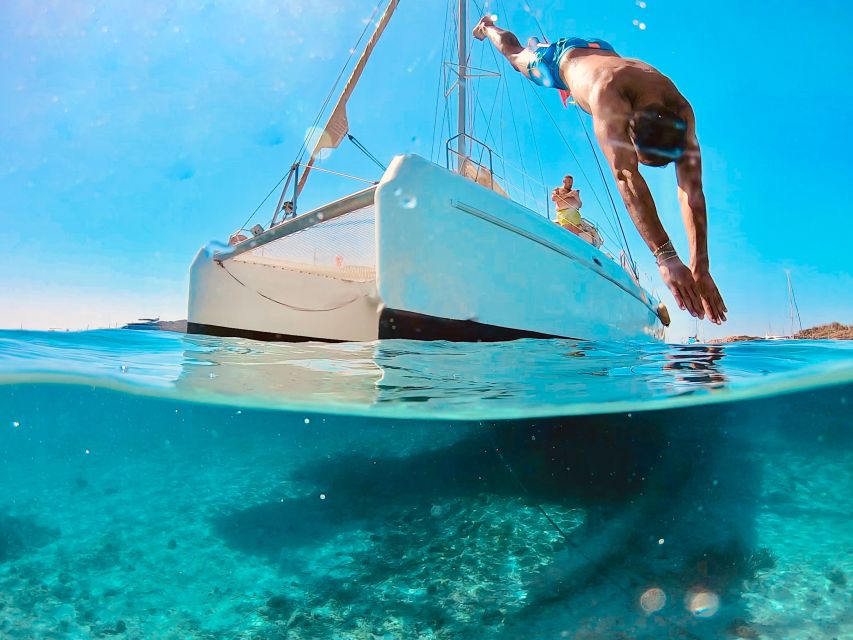 From Palau: Maddalena Archipelago Catamaran Tour with Lunch - Swimming and snorkeling in clear water