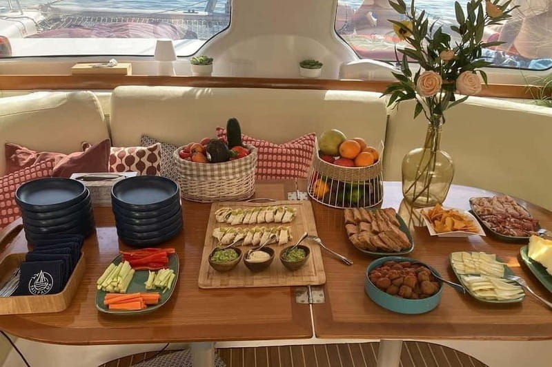 From Palma: Luxury Catamaran Group Tour with Tapas & Drinks - Leaving La Lonja Marina for the Mallorca coast