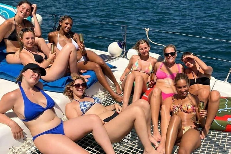 From Palma: Luxury Catamaran Group Tour with Tapas & Drinks - What the crew adds to the experience