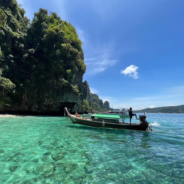 From Phi Phi: Half-Day Longtail Boat Tour with Snorkeling - Guides, group size, and what the crew does