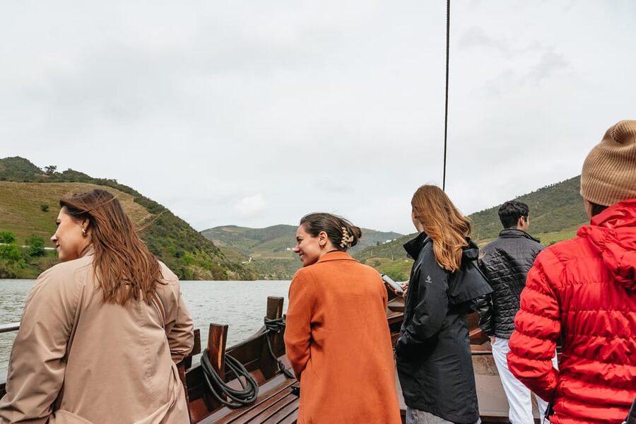 From Porto: Small Group Douro Valley Tour with Wine & Cruise - First winery: vineyards, cellars, and several pours
