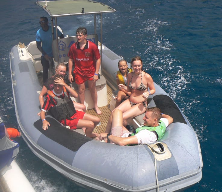 From Puerto Rico: Boat trip along the coast w/ Food & Drinks - Following Gran Canaria’s south coast by catamaran