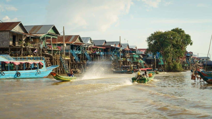 From Siem Reap: Kampong Phluk Floating Village Tour by Boat - Boarding the boat at the pier