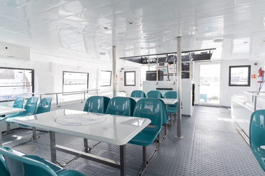 Fuengirola: Catamaran Tour to Spot Dolphins - The bar, toilets, and the so-called glass bottom