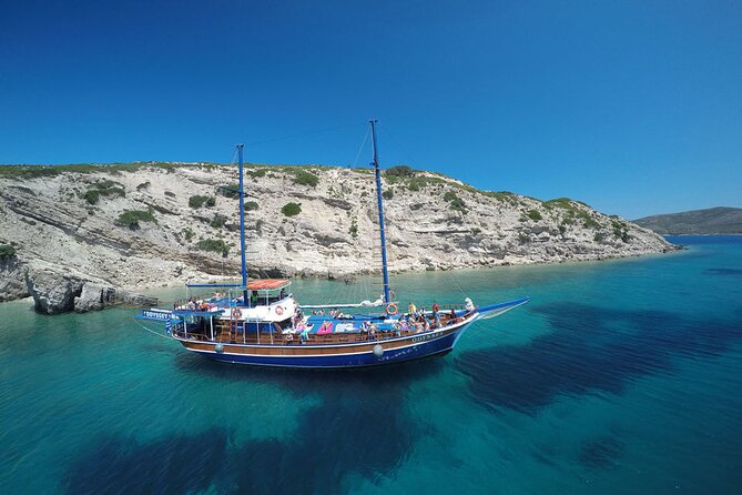 Full Day 3-Island Boat Cruise from Port of Kos - Plati: clear water, a boat swim, and cocktails