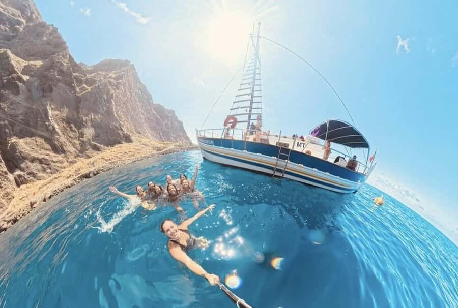 Funchal: Sunset Tour on Traditional Madeiran Boat w/ Drinks - The Cabo Girão swimming stop