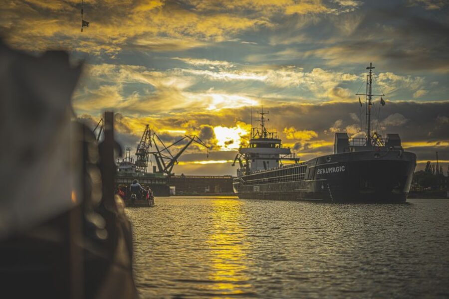 Gdańsk: Sunset Cruise on a Historic Polish Boat - Granary Island, Ołowianka, and the city’s changing waterfront
