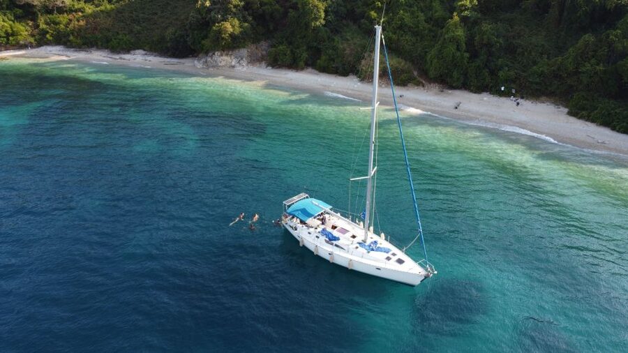 Gouvia: Corfu Island Sailing Trip with Snack and Soft Drinks - Gialiskari, lunch, and the cliff jump