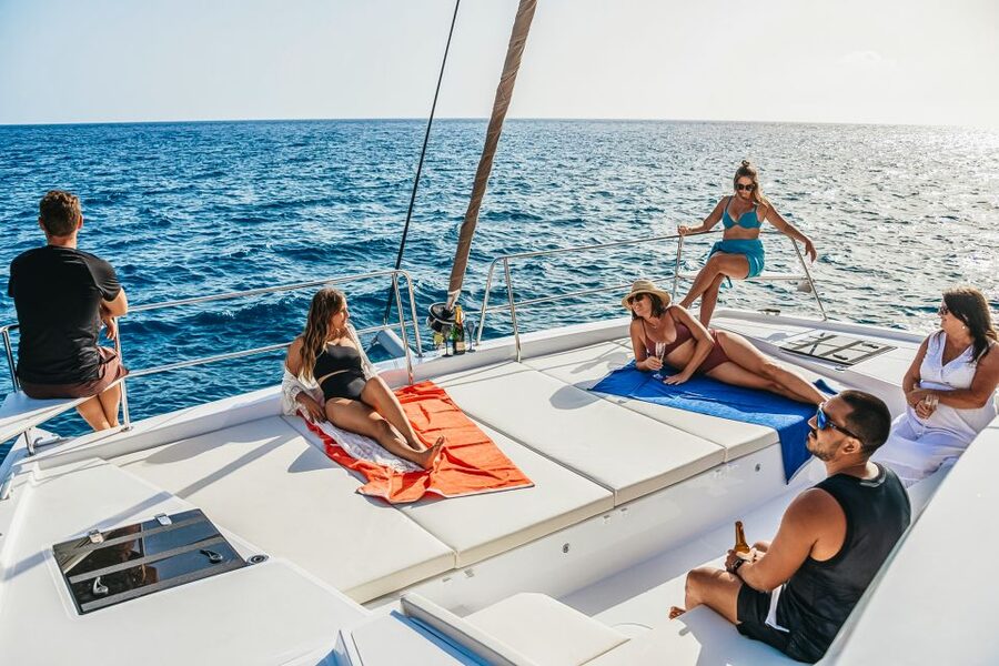 Gran Canaria: Catamaran Day Trip with Food and Drinks - The first stop: swimming, snorkeling, SUP, and kayaking