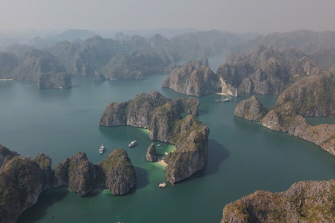 Ha Long Bay Cruise Day Tour - Cave, Kayaking, Swimming & Lunch - Ti Top Island for swimming or a high view
