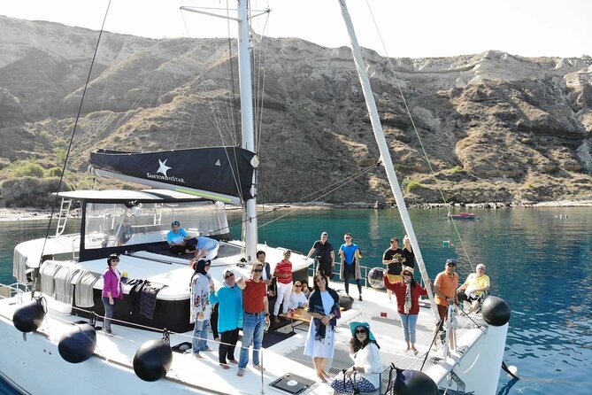 Half-Day Exclusive Catamaran Cruise in Santorini with Meal and Open Bar - The return route and sunset choice