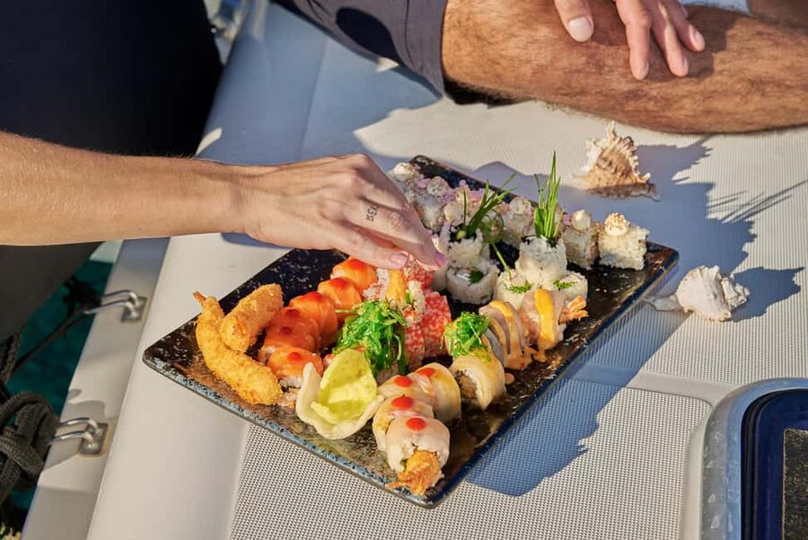 Hersonissos: Luxury Sunset Catamaran Cruise Sushi & Open Bar - Setting sail from Hersonissos Port