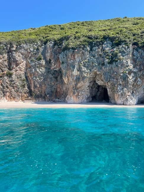 Himara: Albanian Riviera Boat Tour with Swimming stops - Livadhi Beach begins the coastal show