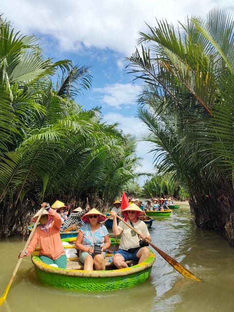 Hoi An: Basket Boat Ride in the Coconut Forest - Watch a fishing net spread across the water