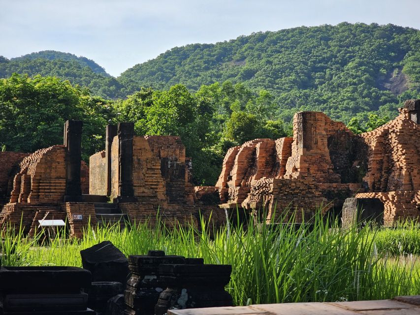 Hoi An: My Son Sanctuary & Sunset River Cruise BBQ or Banhmi - What the guide adds to the temple visit