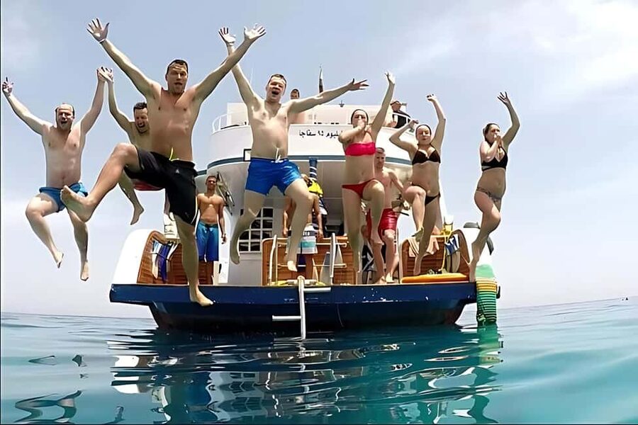Hurghada: Dolphin Watching Boat Tour with Snorkeling & Lunch - Banana boat rides and extra water fun