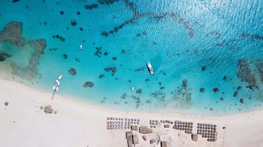 Hurghada: Giftun Island Orange Bay Speedboat Cruise & Lunch - Orange Bay, white sand, and a busy paradise feel