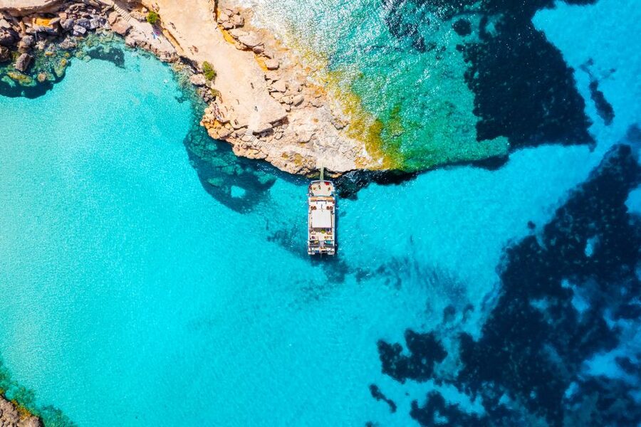 Ibiza: Beach Hopping Cruise w/ Paddleboard, Food, & Drinks - Cala Bassa brings the first proper beach stop