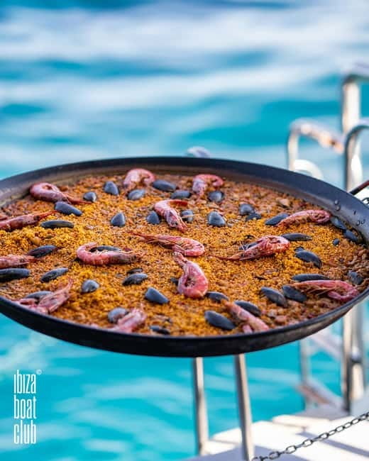 Ibiza: Formentera Sunset Boat Part with Drinks and Food - The evening swim, paella, and sunset