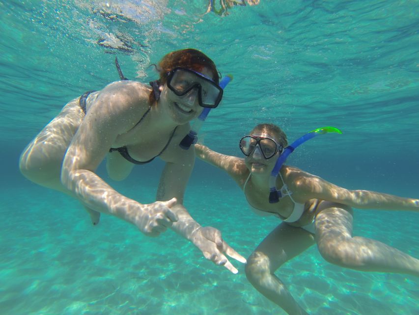 Ibiza: Snorkeling and SUP Paddle, Beach and Cave Boat Tour - Drinks, music, and the boat atmosphere