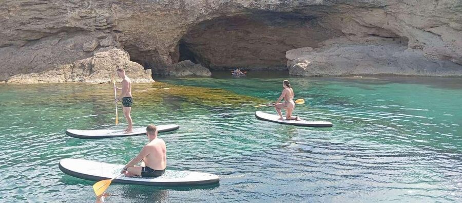 Ibiza: Snorkeling, Sunset Beach and Cave Boat Trip - Drinks, group size, and the onboard mood
