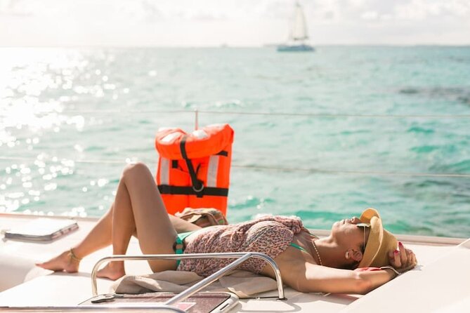 Isla Mujeres Catamaran Tour with Snorkel, Open bar and Transport - A Cancun catamaran day built around music and water
