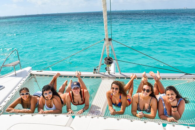 Isla Mujeres Catamaran Tour with Snorkel, Open bar and Transport - Isla Mujeres, Playa Norte, and the time problem