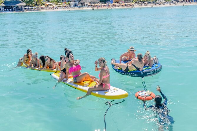 Isla Mujeres Catamaran Tour with Snorkel, Open bar and Transport - Transport, group size, and the practical trade-offs