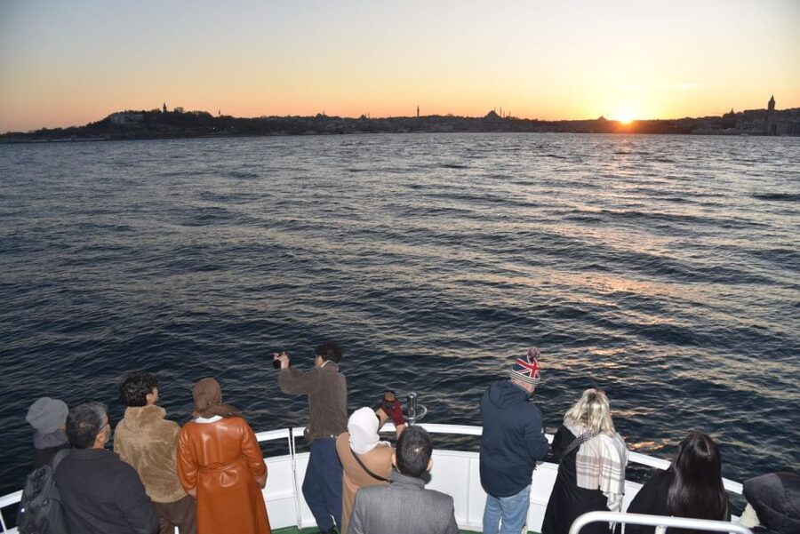 Istanbul: Explore Bosphorous on a Sunset Boat Cruise - The return past Maiden’s Tower