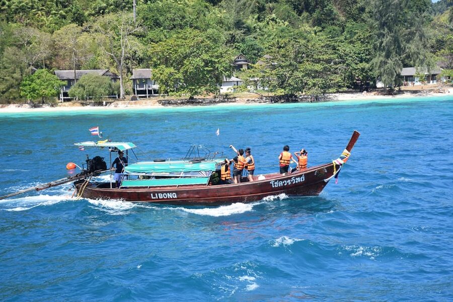 Koh Lanta: 4 Islands and Emerald Cave Tour by Longtail Boat - Hotel pickup, timing, and the return trip