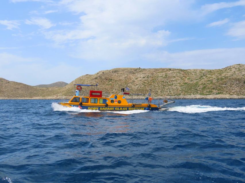 Kos Town: Glass-Bottom Boat Cruise with Swimming Stops - The yellow Dorry at Kos port