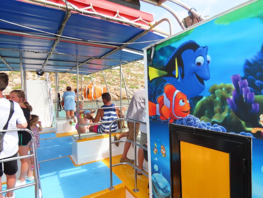 Kos Town: Glass-Bottom Boat Cruise with Swimming Stops - Two glass-bottom viewing areas and the shipwreck