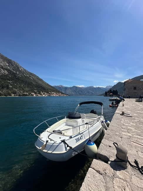 Kotor: Our Lady of the Rocks and Blue Cave Group Boat Tour - Entering the Blue Cave by speedboat