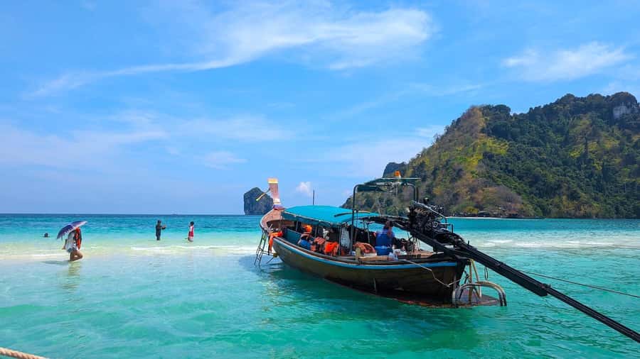 Krabi: Island Hopping Tour by Private Longtail Boat - Boat comfort, food, and the captain’s role