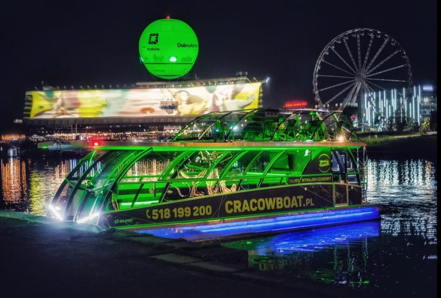 Krakow: Sightseeing Cruise on Vistula River with Audio Guide - A small catamaran with room to change seats