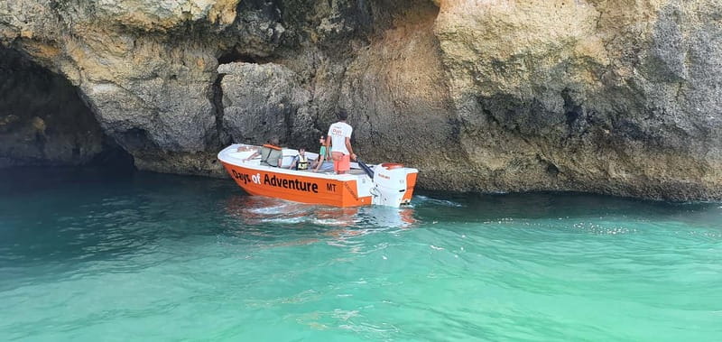 Lagos: Ponta da Piedade Caves Boat Tour - Entering the grottoes in a purpose-built boat