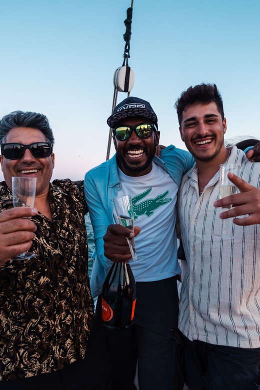 Lagos: Sunset Sail aboard a Traditional Boat with Prosecco - Along the Lagos Golden Coast