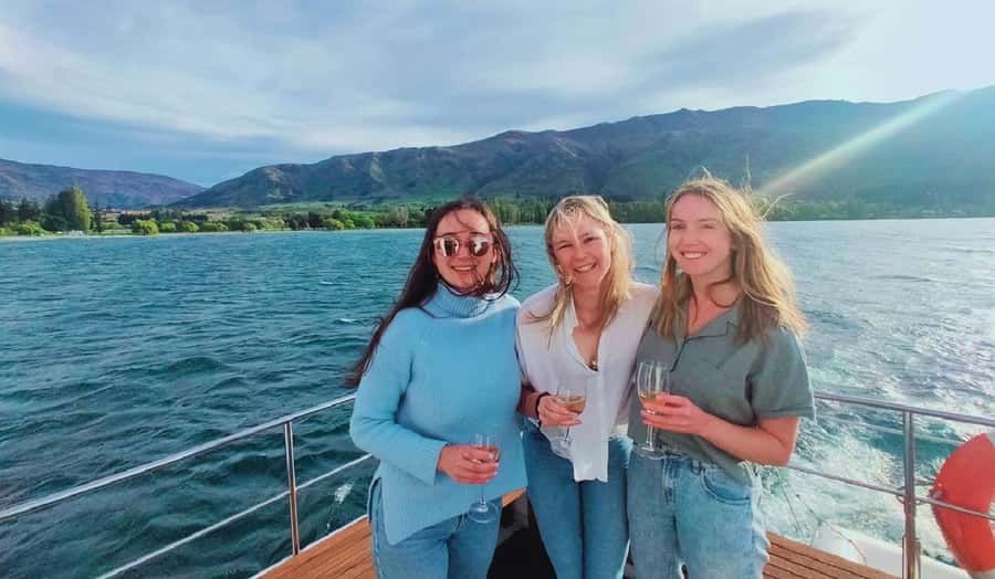 Lake Wanaka Happy Hour Cruise - Meeting the white catamaran beside the old jetty