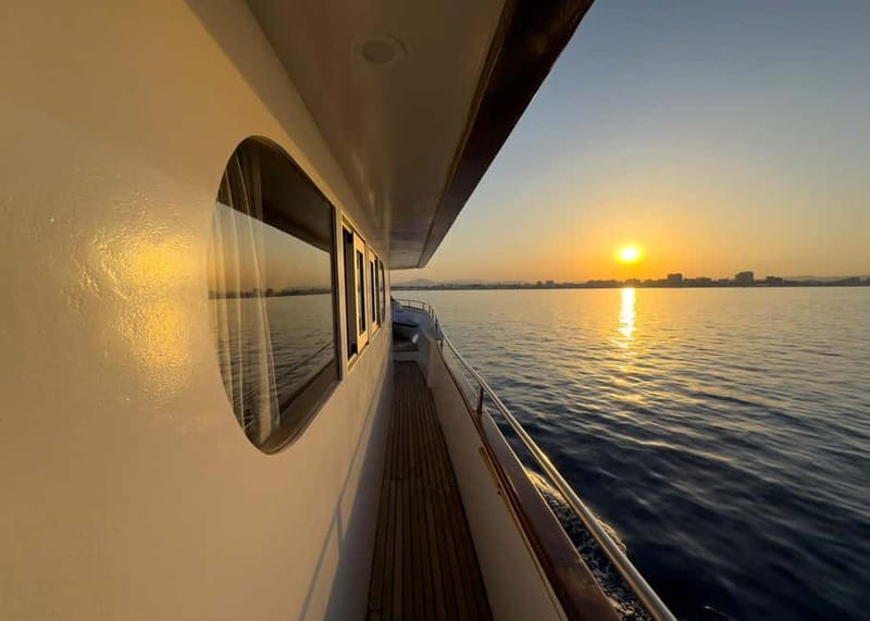 Larnaca: Sunset Cruise with a Glass of Wine - The Mackenzie Beach swim stop