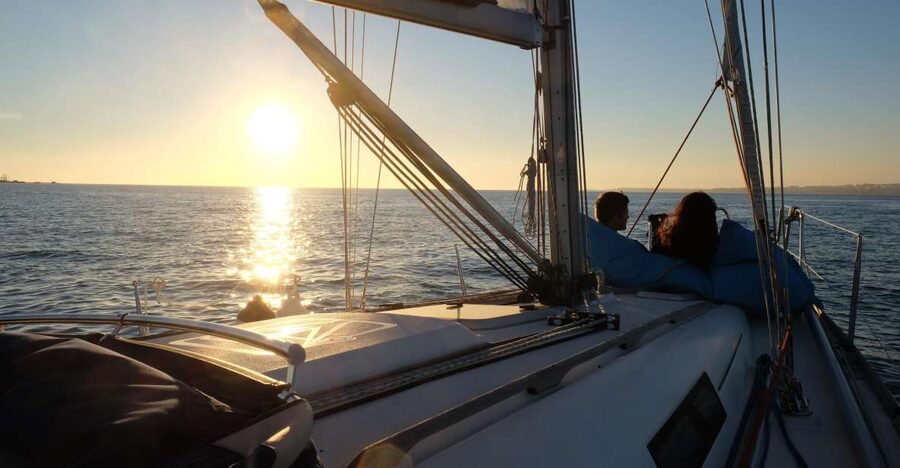 Lisbon: City Skyline Sailboat Cruise with Drink and Snacks - Belém Tower and the western waterfront