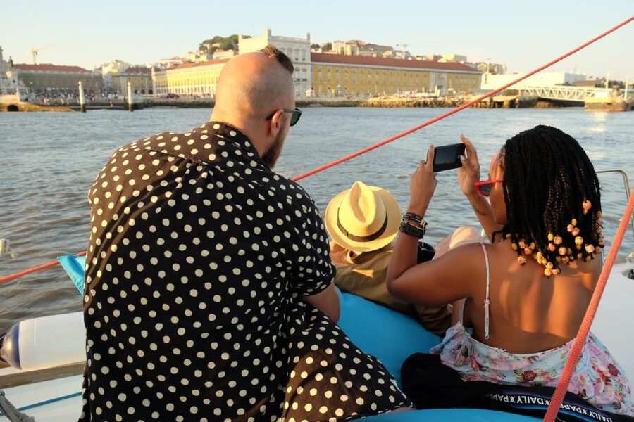 Lisbon: City Skyline Sailboat Cruise with Drink and Snacks - A drink, local snacks, and the social side