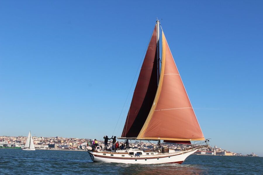 Lisbon: Daylight or Sunset on a Vintage Sailboat - Meeting the boat beneath the 25 de Abril Bridge