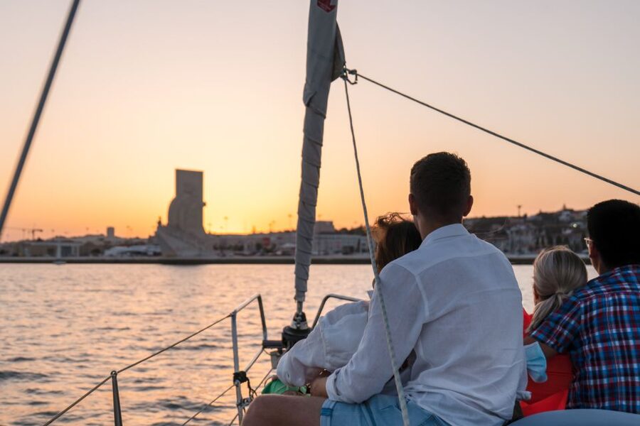 Lisbon: Daytime/Sunset/Night City Sailboat Tour with Drink - What the drink and crew add to the experience