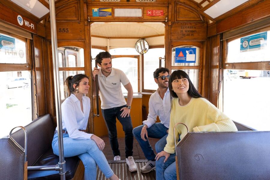 Lisbon: Helicopter Ride, Boat Trip, & Old Town Walking Tour - The helicopter flight near the 25 de Abril Bridge