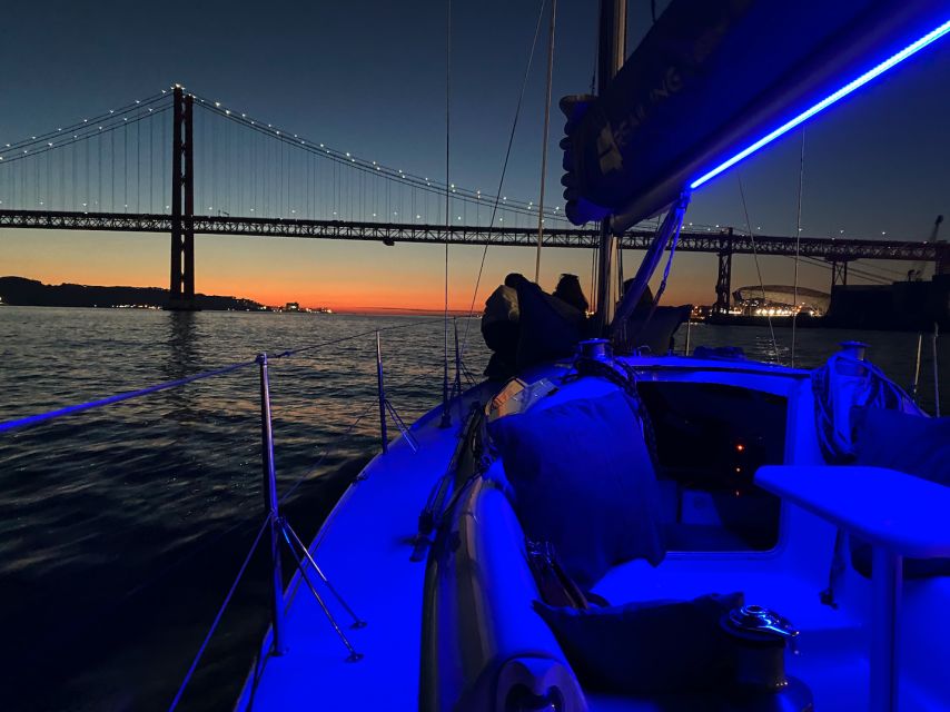 Lisbon: Sailboat Tour w/ Local Guide and Open Bar Green Wine - Commerce Square and Lisbon after sunset